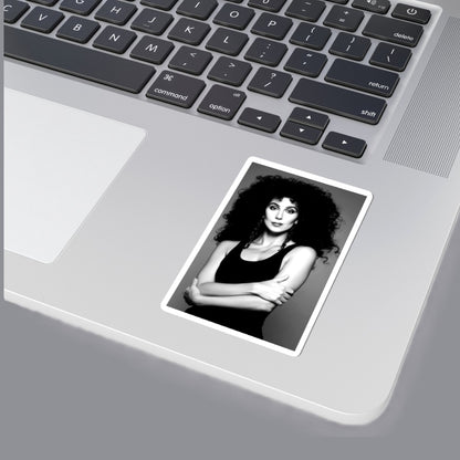 A black and white portrait print of  Cher with voluminous curly hair, wearing a black tank top and dangling earrings, centered within a white border on a gray background. For sale in The Pink Rocket NOLA gay gift shop.