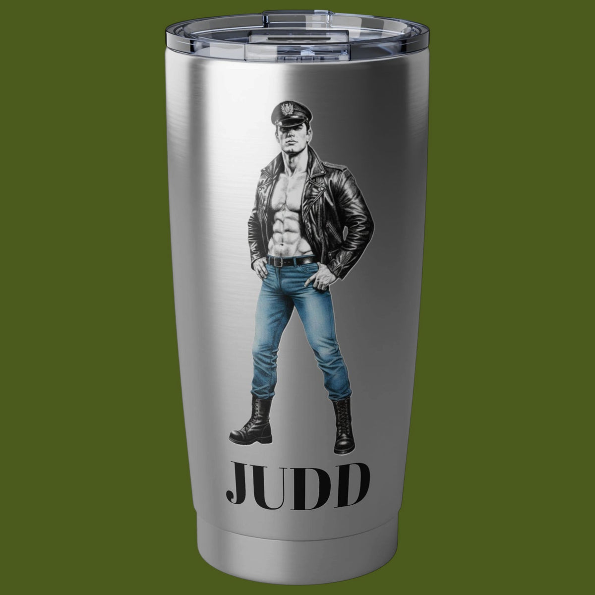 A brushed stainless steel tumbler with a clear lid, featuring a graphic of a muscular Tom of Finland man in a black leather jacket and blue jeans, peraonalized. with the name Judd For sale in The Pink Roket New Orleans gay gift shop.