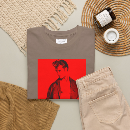 A short-sleeve t-shirt folded with a graphic print of a gay muscular man wearing a Versace shirt in a 1990s ad. Designed and for sale in The Pink Rocket New Orleans gay gift shop.
