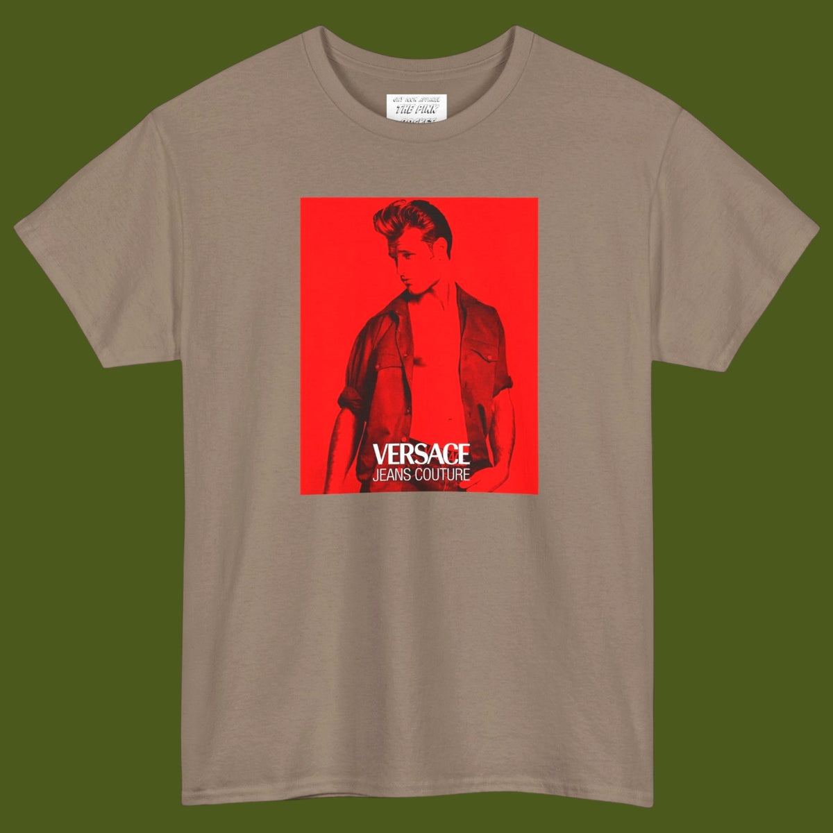 A short-sleeve t-shirt with a graphic print of a gay muscular man wearing a Versace shirt in a 1990s ad. Designed and for sale in The Pink Rocket New Orleans gay gift shop.