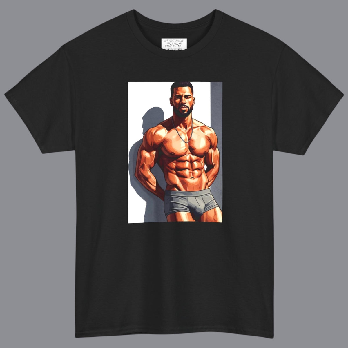 A black short-sleeve crewneck t-shirt featuring a large graphic print on the front of a gay black muscular male bodybuilder posing in gray briefs. Designed and sold in The Pink Rocket New Orleans gift shop.