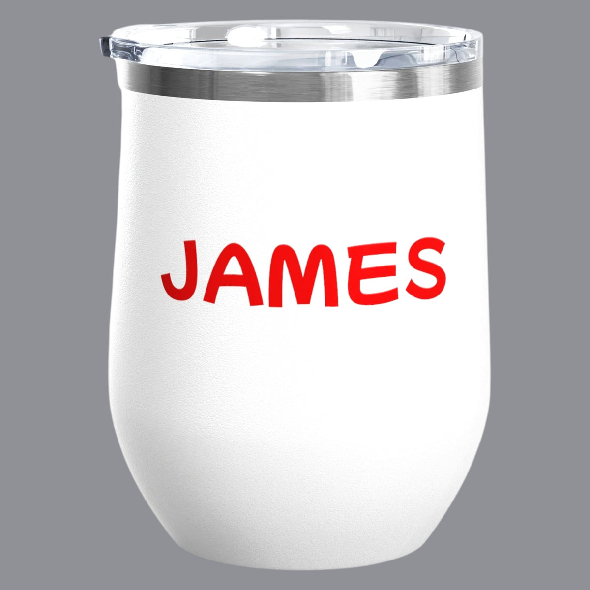 A personalized white 12oz. insulated stemless wine tumbler with a clear lid. The tumbler features a colorful graphic of dancing figures and the words 'GAY ICON' in red, yellow, and blue. Designed and sold in The Pink Rocket New Orleans gay gift shop.