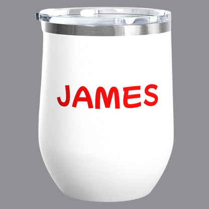 A personalized white 12oz. insulated stemless wine tumbler with a clear lid. The tumbler features a colorful graphic of dancing figures and the words 'GAY ICON' in red, yellow, and blue. Designed and sold in The Pink Rocket New Orleans gay gift shop.