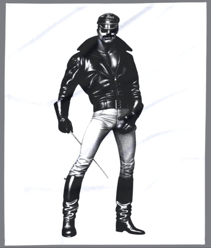 A black and white Tom of finland style image of a muscular gay man wearing a black leather jacket, aviator sunglasses, light-colored pants, and tall black boots, holding a thin rod. Designed and for sale in The Pink Rocket New Orleans gay gift shop.