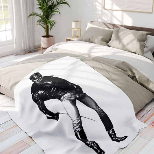 A black and white Tom of finland style image of a muscular gay man wearing a black leather jacket, aviator sunglasses, light-colored pants, and tall black boots, holding a thin rod. Designed and for sale in The Pink Rocket New Orleans gay owned small business.