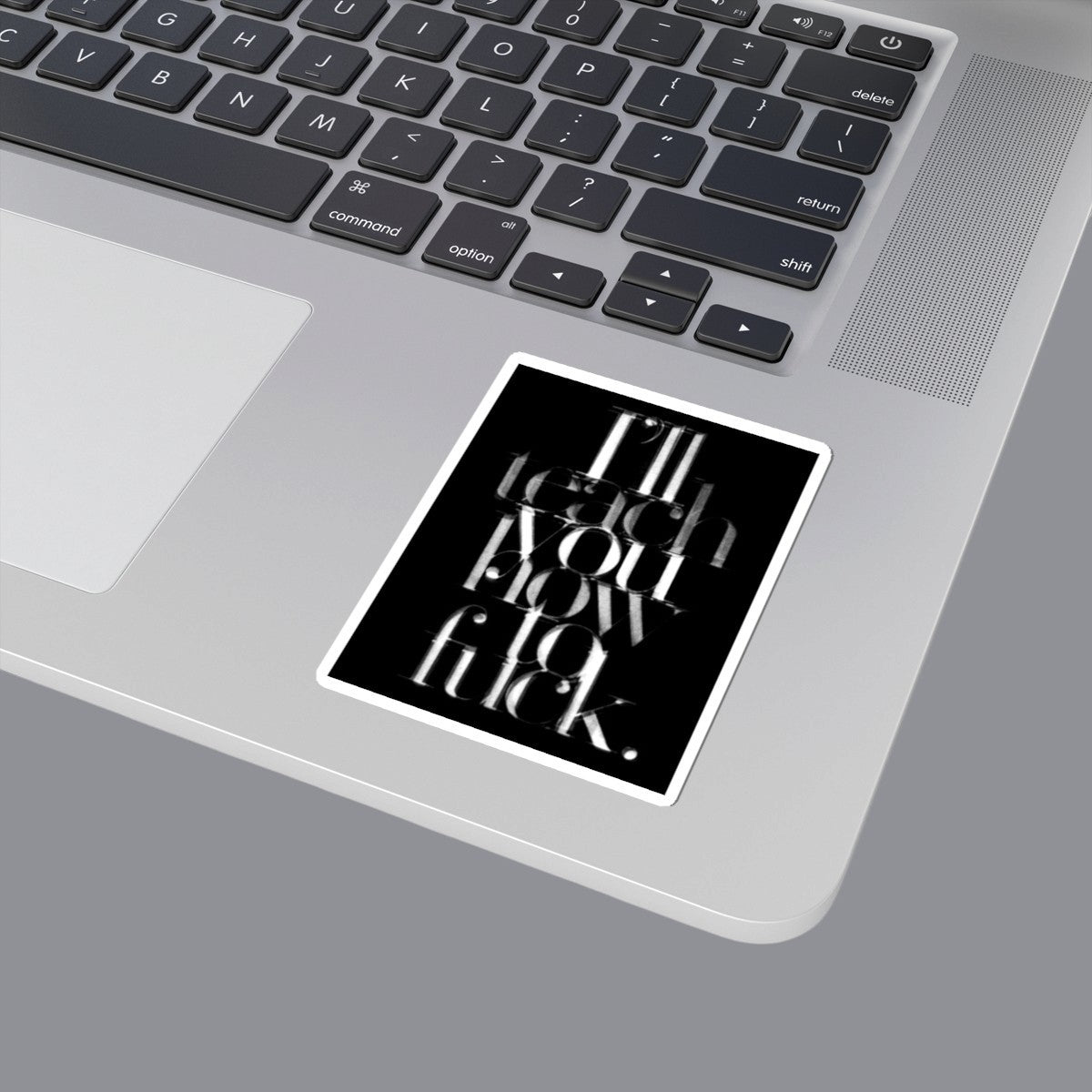 A typographic vinyl sticker on a laptop  featuring the text 'I'll teach you how to fuck.' in layered white lettering on a black background, with a thin white border around the print. Available in The Pink Rocket New Orleans gay gift shop.