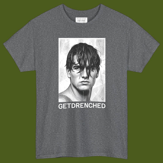 A gray crewneck t-shirt featuring a black and white graphic print of a gay man's face with the text 'GETDRENCHED' underneath. Designed and available in The Pink Rocket New Orleans gay owned gift shop.