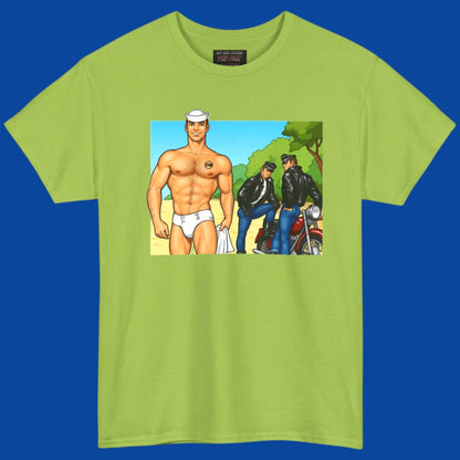 A man wearing a bright lime green t-shirt with a graphic print of a hunky muscular man in white briefs, standing outdoors being crusied by sey motercycle men in leather. Designed and sold in The Pink Rocket New Orleans gift shop for gay men.