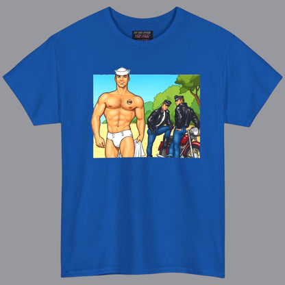 A man wearing a bright navy blue t-shirt with a graphic print of a hunky muscular man in white briefs, standing outdoors being crusied by sey motercycle men in leather. Designed and sold in The Pink Rocket New Orleans gift shop for gay men.