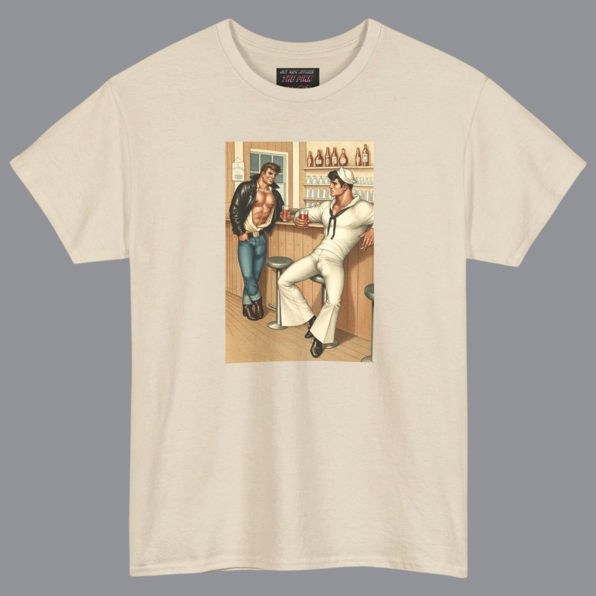 An off white beige crewneck t-shirt featuring a vintage-style graphic print of hunky gay two men in a bar. For sale in The Pink Rocket New Orleans gay owned gift shop.