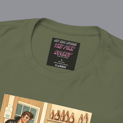 Closeup of an olive green crewneck t-shirt featuring a vintage-style graphic print of hunky gay two men in a bar. For sale in The Pink Rocket New Orleans gay owned gift shop.