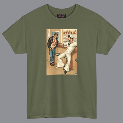 An olive green crewneck t-shirt featuring a vintage-style graphic print of hunky gay two men in a bar. For sale in The Pink Rocket New Orleans gay owned gift shop.