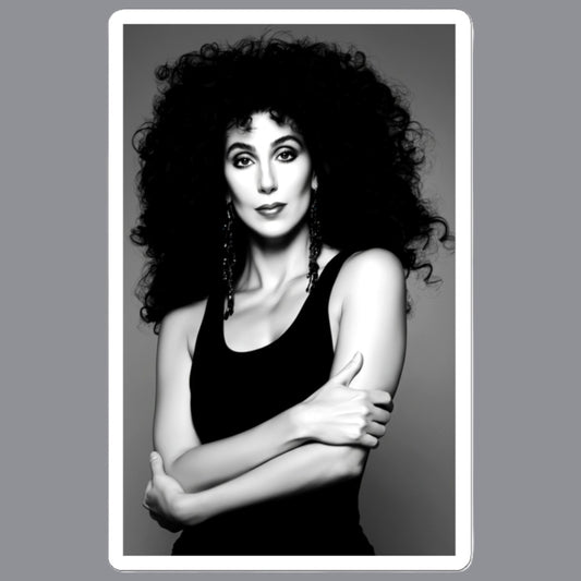 A black and white portrait print of  Cher with voluminous curly hair, wearing a black tank top and dangling earrings, centered within a white border on a gray background. For sale in The Pink Rocket NOLA gay gift shop.