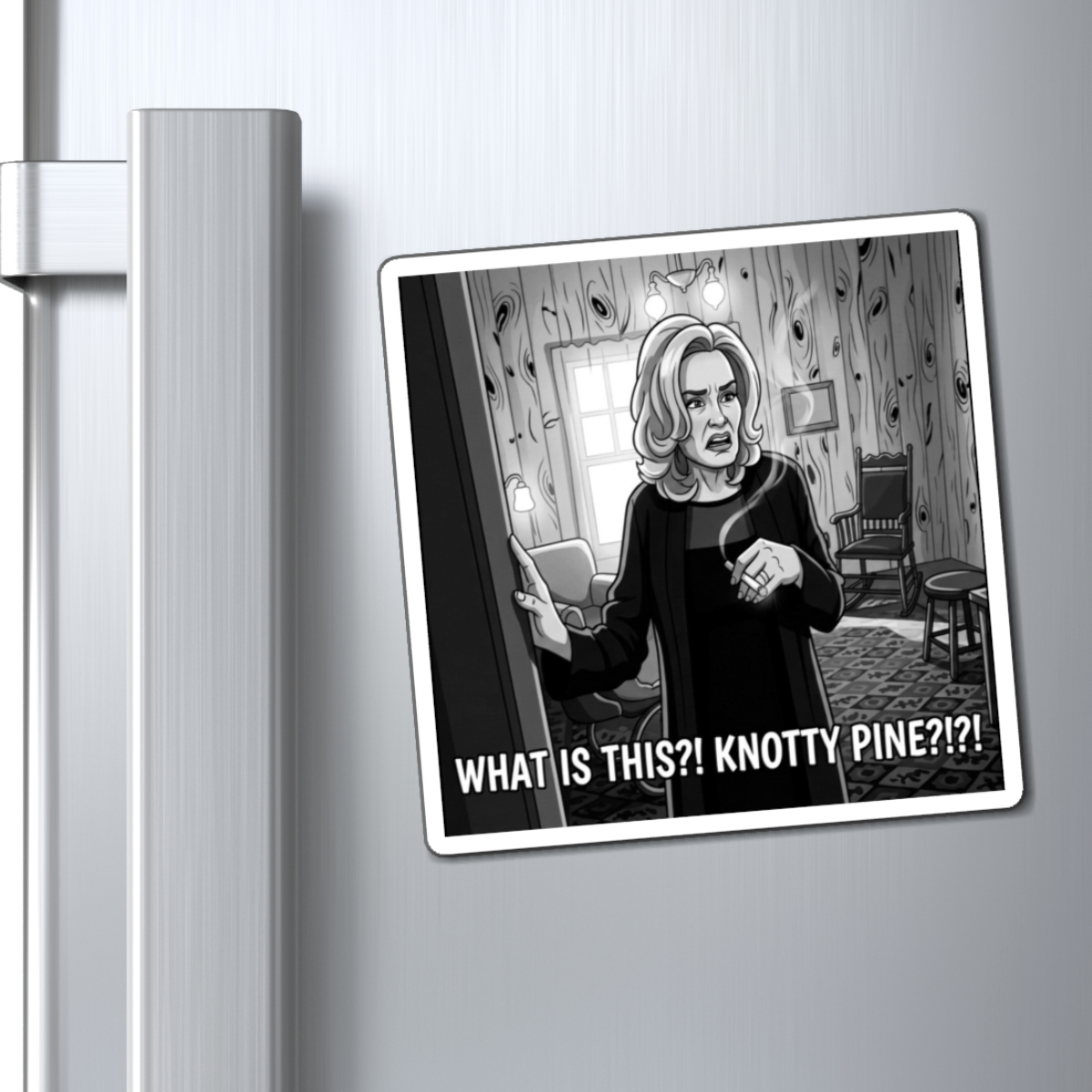 Black and white cartoon-style illustration fridge magnet of a Fiona Goode witch standing in a room with wood-paneled walls, holding her hands up defensively, with the text 'WHAT IS THIS?! KNOTTY PINE?!?!!' at the bottom. For sale in The Pink Rocket New Orleans gay gift shop.
